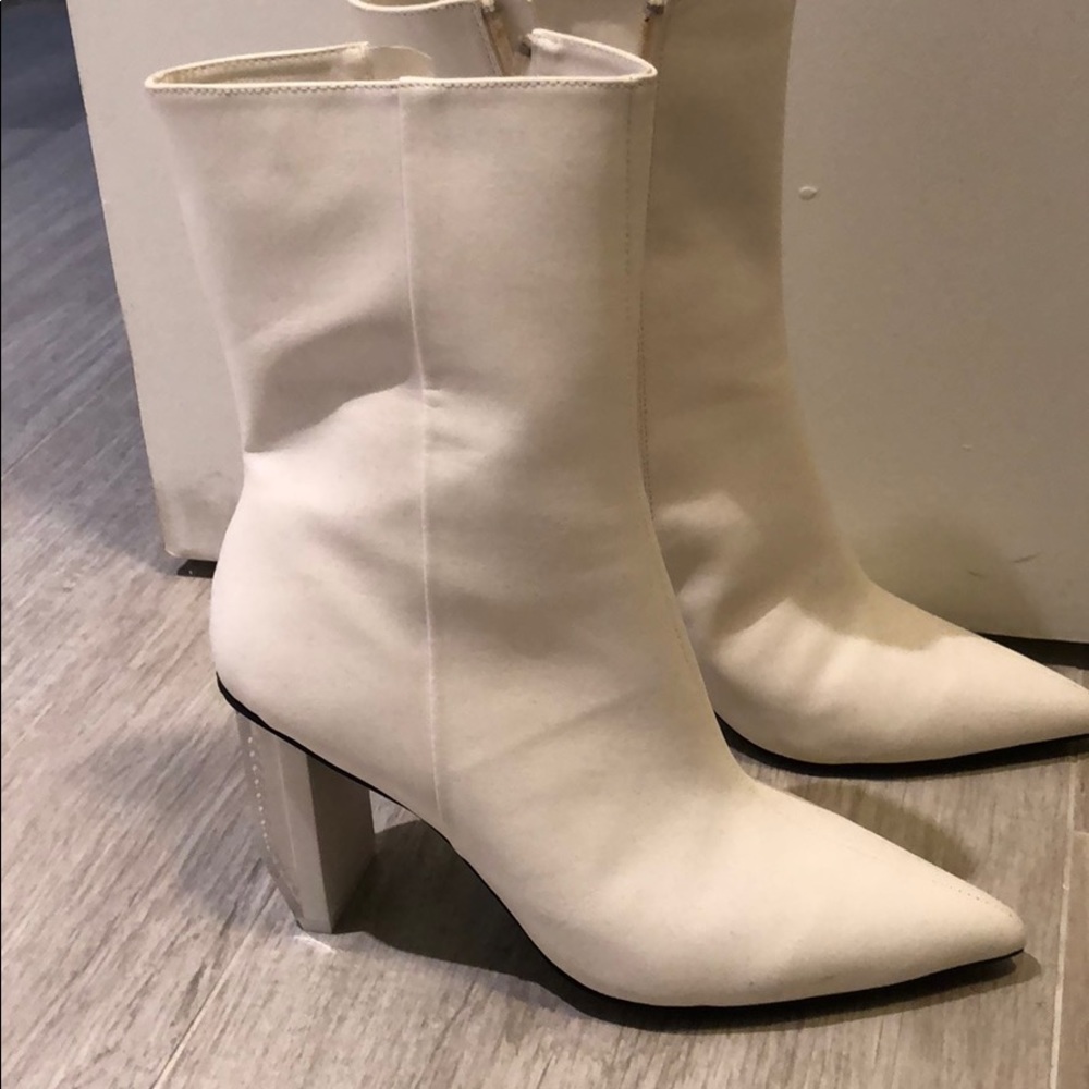 Never worn white boots